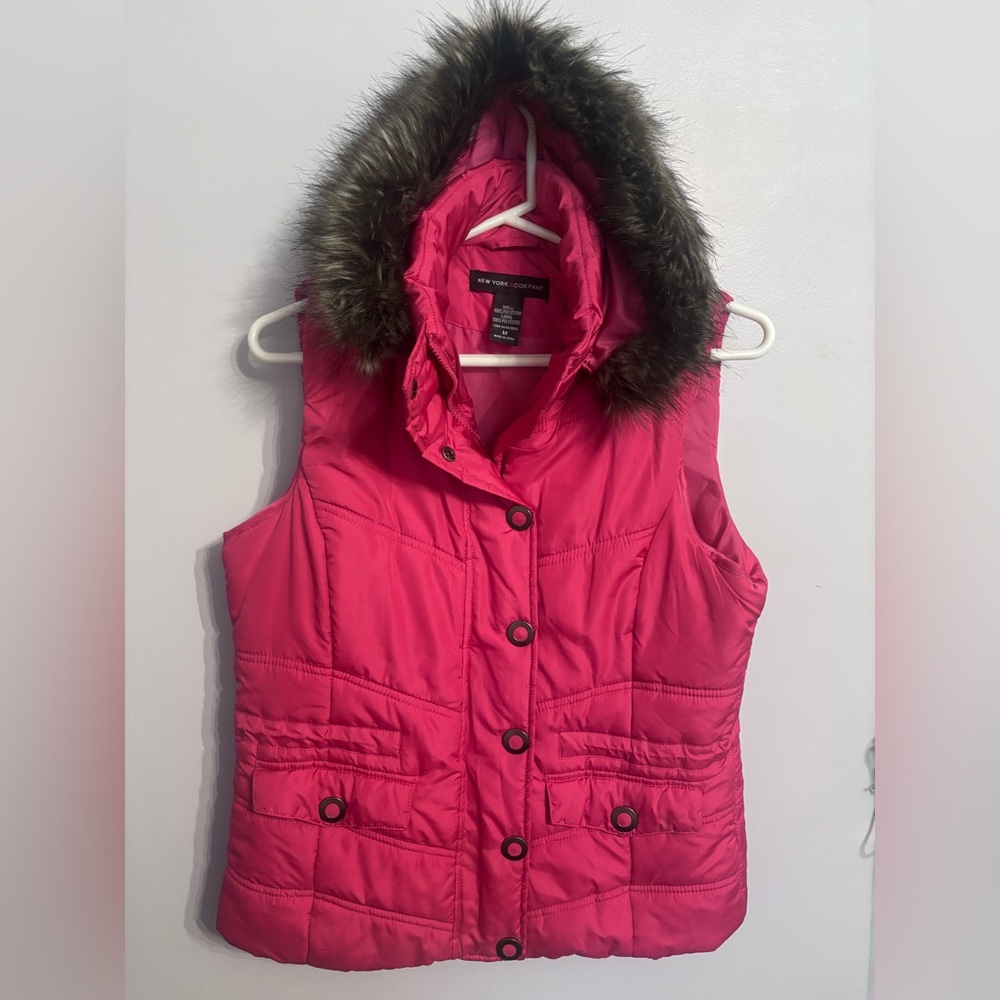 New York pink vest with the hood. In great condition.